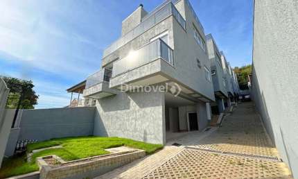 Casa em condomínio fechado com 3 quartos à venda na Rua Liberal, 965, Tristeza, Porto Alegre por R$ 1.020.000