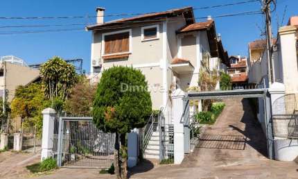 Casa em condomínio fechado com 3 quartos à venda na Rua Padre João Batista Reus, 2083, Tristeza, Porto Alegre por R$ 680.000