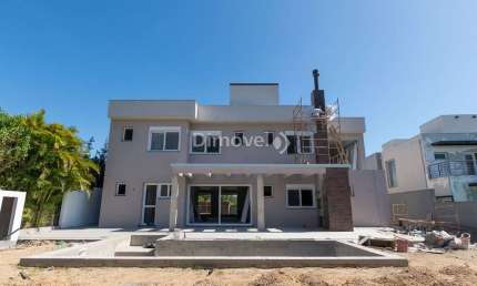 Casa em condomínio fechado com 5 quartos à venda na Avenida Juca Batista, 8000, Belém Novo, Porto Alegre por R$ 5.560.000