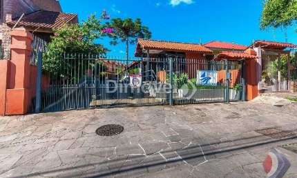 Casa em condomínio fechado com 3 quartos à venda na Rua Sílvio Silveira Soares, 2406, Camaquã, Porto Alegre por R$ 375.000