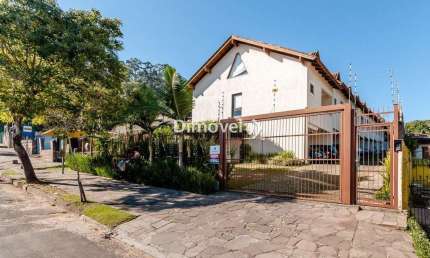 Casa em condomínio fechado com 3 quartos à venda na Rua Liberal, 643, Tristeza, Porto Alegre por R$ 600.000