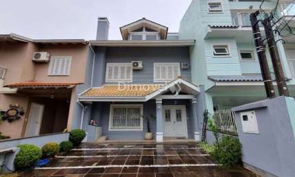 Casa em condomínio fechado com 3 quartos à venda na Rua Corticeira, 431, Hípica, Porto Alegre por R$ 699.000