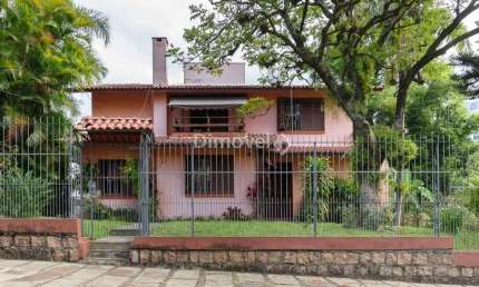 Casa com 6 quartos à venda na Rua Itapitocaí, 725, Cristal, Porto Alegre por R$ 1.590.000
