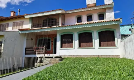 Casa com 4 quartos à venda na Rua Jaguari, 748, Cristal, Porto Alegre por R$ 800.000