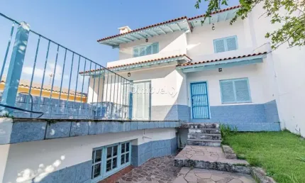 Casa com 3 quartos à venda na Rua Padre João Batista Reus, 1767, Tristeza, Porto Alegre por R$ 620.000