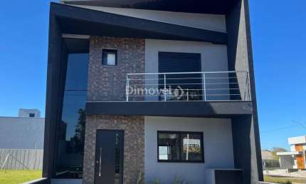 Casa em condomínio fechado com 3 quartos à venda na Avenida Juca Batista, 5505, Hípica, Porto Alegre por R$ 800.000