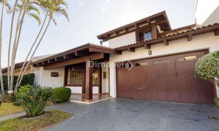 Casa com 3 quartos à venda na Rua Engenheiro Coelho Parreira, 384, Ipanema, Porto Alegre por R$ 1.180.000