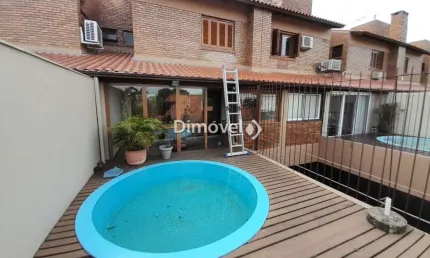Casa em condomínio fechado com 3 quartos à venda na Rua Doutor David de Azevedo Gusmão, 185, Jardim Isabel, Porto Alegre por R$ 1.060.000