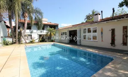 Casa com 4 quartos à venda na Travessa Pedra Redonda, 130, Jardim Isabel, Porto Alegre por R$ 1.950.000