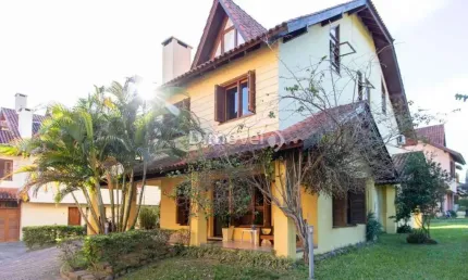 Casa em condomínio fechado com 3 quartos à venda na Rua Luís Felipe Monmany, 101, Guarujá, Porto Alegre por R$ 650.000