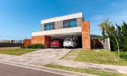 Casa em condomínio fechado com 4 quartos à venda na Estrada das Três Meninas, 1400, Vila Nova, Porto Alegre por R$ 3.600.000