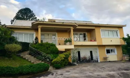 Casa com 4 quartos à venda na rua morro alto, 155, campo novo, porto alegre por r$ 850.000