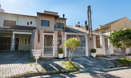 Casa com 3 quartos à venda na Rua Norival Paranaguá de Andrade, 41, Hípica, Porto Alegre por R$ 585.000