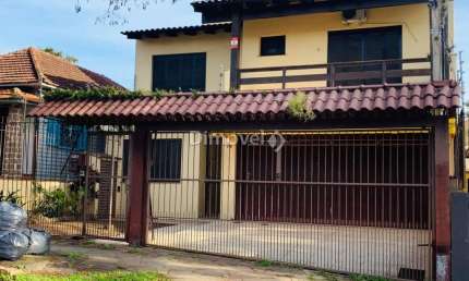 Casa com 3 quartos à venda na Rua Otávio Faria, 73, Teresópolis, Porto Alegre por R$ 1.300.000