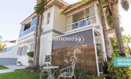 Casa com 4 quartos à venda na Rua Adão Pinheiro da Silva, 140, Ipanema, Porto Alegre por R$ 950.000