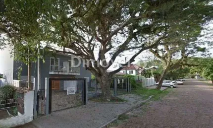 Casa com 3 quartos à venda na Rua Jacundá, 89, Guarujá, Porto Alegre por R$ 500.000