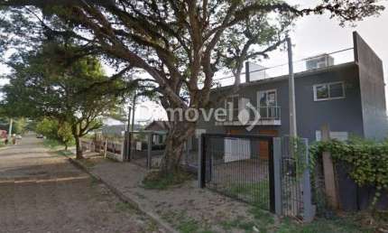 Casa com 3 quartos à venda na Rua Jacundá, 87, Guarujá, Porto Alegre por R$ 500.000