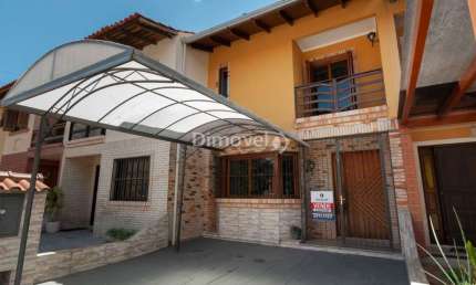 Casa em condomínio fechado com 2 quartos à venda na Avenida Edgar Pires de Castro, 1286, Hípica, Porto Alegre por R$ 370.000