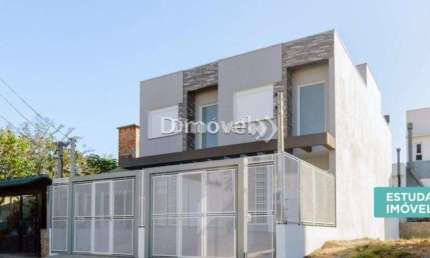 Casa com 3 quartos à venda na Rua Doutor Cláudio Walter Ferreira da Silva, 251, Guarujá, Porto Alegre por R$ 430.000