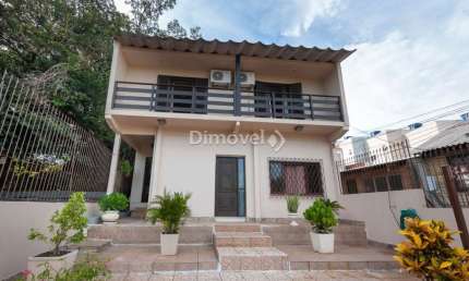 Casa com 4 quartos à venda na Avenida Belém Velho, 2335, Vila Nova, Porto Alegre por R$ 695.000