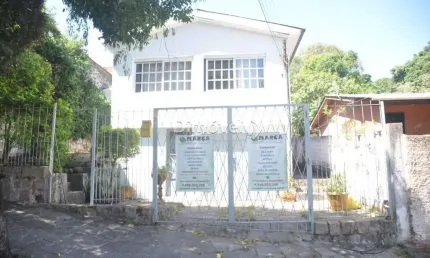 Casa com 3 quartos à venda na Rua Liberal, 1115, Tristeza, Porto Alegre por R$ 450.000