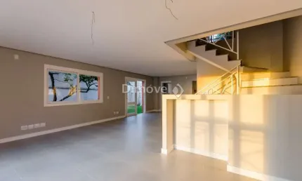 Casa em condomínio fechado com 4 quartos à venda na Avenida Guaíba, 4400, Vila Assunção, Porto Alegre por R$ 1.300.000