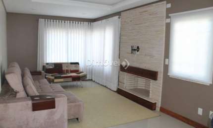 Casa em condomínio fechado com 3 quartos à venda na Avenida Edgar Pires de Castro, 540, Hípica, Porto Alegre por R$ 1.500.000
