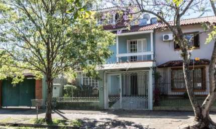 Casa com 3 quartos à venda na Rua Pasteur, 456, Ipanema, Porto Alegre por R$ 699.000