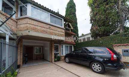 Casa com 3 quartos à venda na Avenida Copacabana, 358, Tristeza, Porto Alegre por R$ 1.065.000