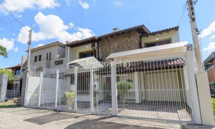 Casa com 4 quartos à venda na Rua Adão Pinheiro da Silva, 420, Ipanema, Porto Alegre por R$ 1.190.000