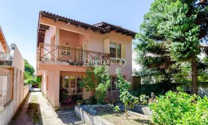 Casa com 6 quartos à venda na Rua Padre João Batista Reus, 708, Vila Conceição, Porto Alegre por R$ 1.500.000