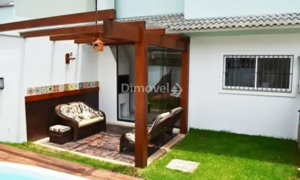 Casa em condomínio fechado com 3 quartos à venda na Rua Corticeira, 754, Hípica, Porto Alegre por R$ 730.000