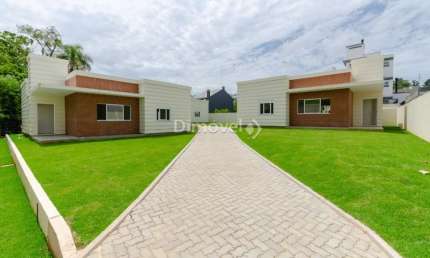 Casa em condomínio fechado com 3 quartos à venda na Rua Canísio Binsfeld, 226, Hípica, Porto Alegre por R$ 595.000