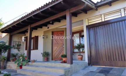 Casa com 3 quartos à venda na Rua Francisco Mattos Terres, 80, Hípica, Porto Alegre por R$ 520.000