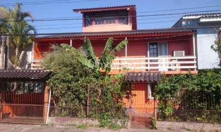 Casa com 4 quartos à venda na Rua Vinte e Um de Agosto, 183, Cavalhada, Porto Alegre por R$ 550.000