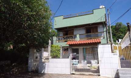 Casa com 3 quartos à venda na Rua Liberal, 1025, Tristeza, Porto Alegre por R$ 650.000