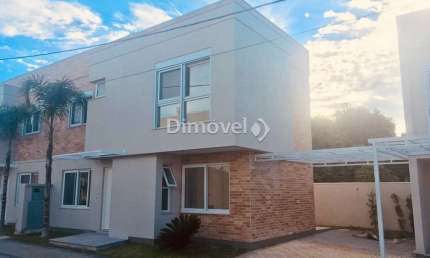 Casa em condomínio fechado com 3 quartos à venda na Estrada João Salomoni, 500, Vila Nova, Porto Alegre por R$ 1.049.000