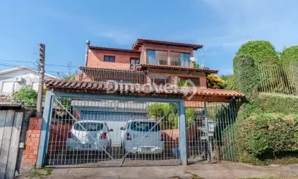 Casa com 5 quartos à venda na Rua João Ribeiro de Barros, 220, Espírito Santo, Porto Alegre por R$ 450.000