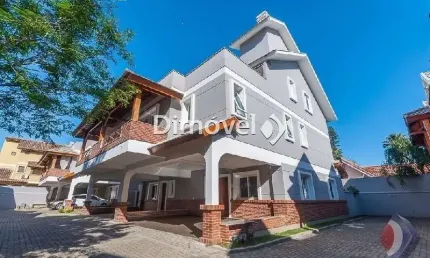 Casa em condomínio fechado com 3 quartos à venda na Rua General Rondon, 59, Vila Assunção, Porto Alegre por R$ 1.950.000