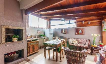 Casa em condomínio fechado com 3 quartos à venda na Rua Olécio Cavedini, 255, Ipanema, Porto Alegre por R$ 960.000