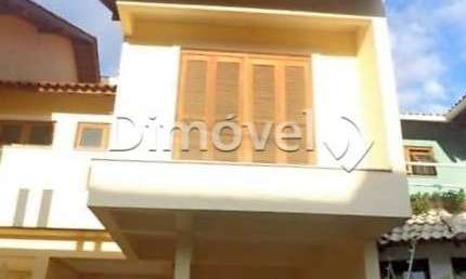 Casa em condomínio fechado com 3 quartos à venda na Rua Pau Brasil, 778, Hípica, Porto Alegre por R$ 425.000