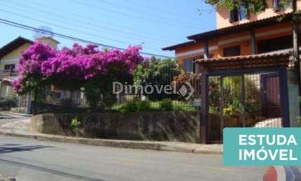 Casa com 5 quartos à venda na Rua Ângelo Passuelo, 79, Vila Nova, Porto Alegre por R$ 650.000