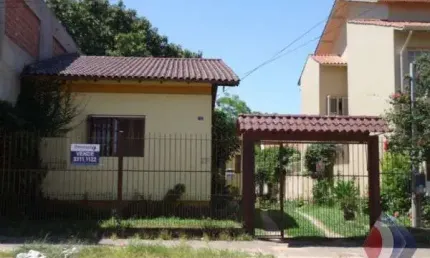 Casa com 4 quartos à venda na rua dona zulmira, 158, cavalhada, porto alegre por r$ 553.000