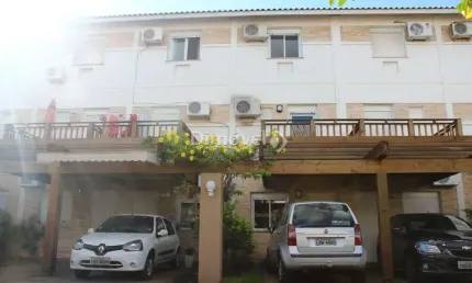 Casa em condomínio fechado com 3 quartos à venda na Avenida Juca Batista, 473, Ipanema, Porto Alegre por R$ 384.000