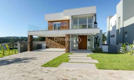 Casa em condomínio fechado com 3 quartos à venda na Estrada das Três Meninas, 1400, Vila Nova, Porto Alegre por R$ 2.390.000