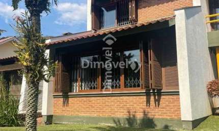 Casa com 3 quartos à venda na Rua Jigoro Kano, 55, Jardim Isabel, Porto Alegre por R$ 1.580.000