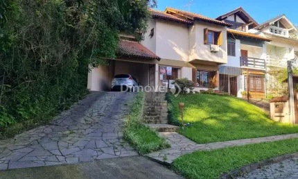Casa com 3 quartos à venda na Rua Edgar Luiz Schneider, 12, Jardim Isabel, Porto Alegre por R$ 560.000