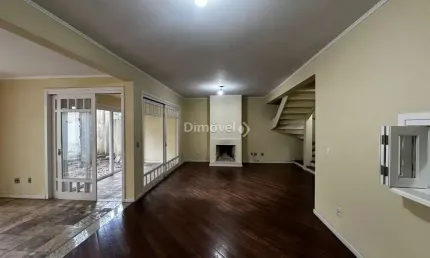 Casa em condomínio fechado com 3 quartos para alugar na Avenida Coronel Marcos, 483, Pedra Redonda, Porto Alegre por R$ 5.000