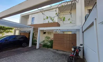 Casa em condomínio fechado com 3 quartos para alugar na Rua Landel de Moura, 1541, Tristeza, Porto Alegre por R$ 3.900