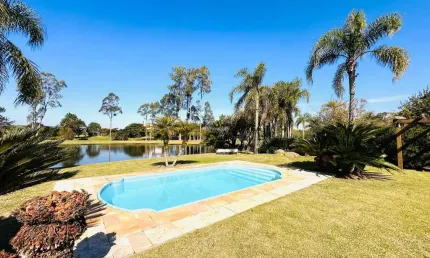 Casa em condomínio fechado com 4 quartos para alugar na avenida juca batista, 8000, belém novo, porto alegre por r$ 15.000